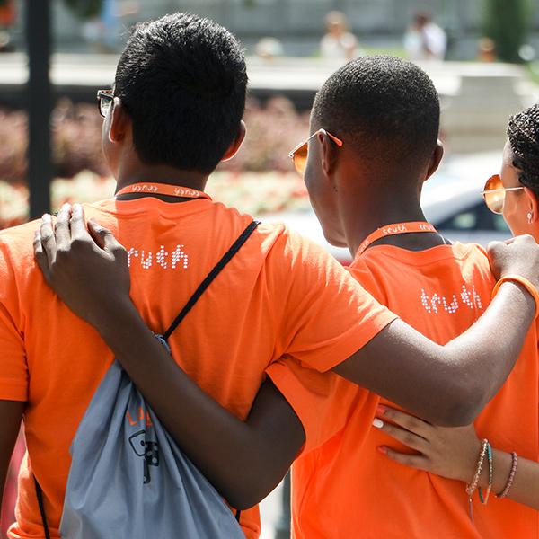 three young activists in truth shirts